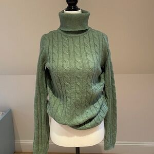 Cableknit turtleneck sweater